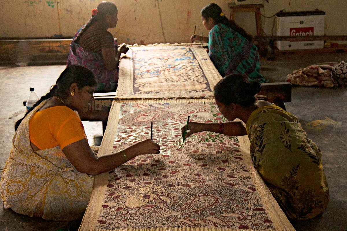 When all the required areas are painted with red colour on the fabric, it is kept to dry for two days. col-sm-4