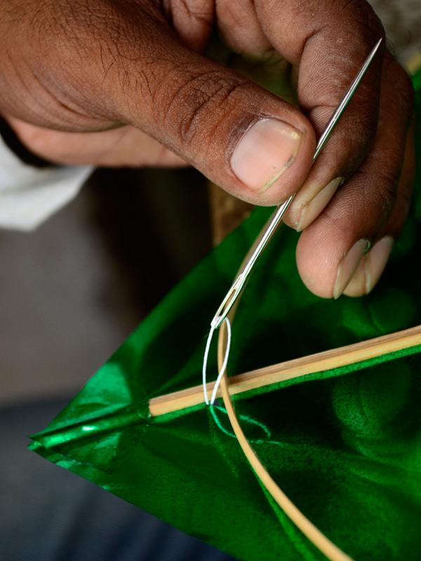 Thread for kite flying (manja or manjha) being prepared with